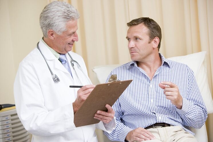 Doctor and patient before penis enlargement surgery